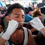 En Huixtla, Chiapas migrantes de la caravana se suturan los labios